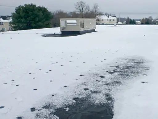 commercial roofing expert winter roof inspection